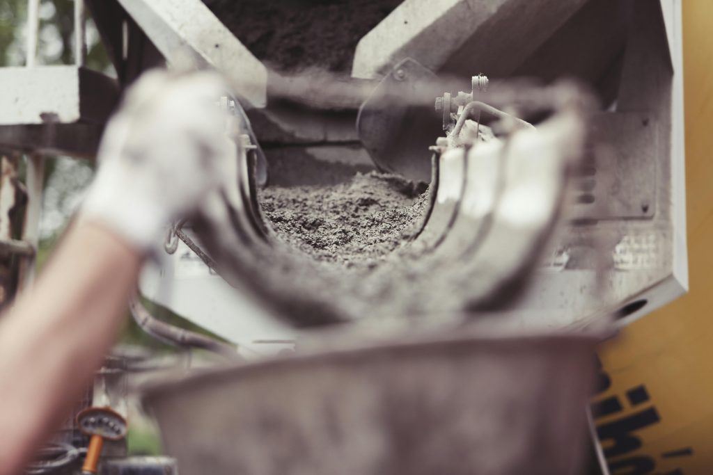 Photo by Life Of Pix: (https://www.pexels.com/photo/cement-flowing-at-construction-site-2469/)